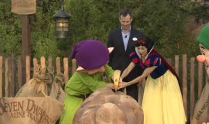 Snow White and Dopey Dedicate the 7 Dwarf Mine Train
