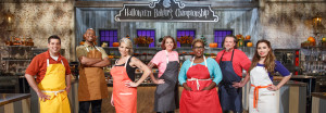 Contestants, from left, Brad Rudd, Damienx Bagley, Amy Strickland, Michelle Antonishek Tamara Brown, John Schopp, and Veronica von Borstel pose for a portrait, as seen on Food Network's Halloween Baking Championship, Season 2.