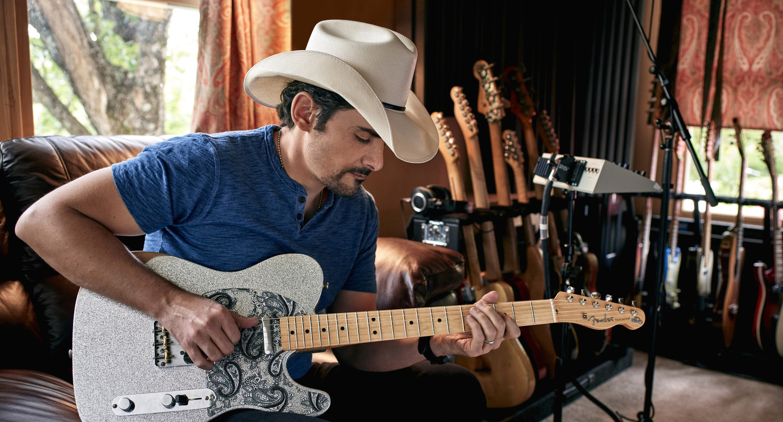 Brad Paisley with his Fender artist signature guitar: the Fender Brad Paisley Road Worn Telecaster
